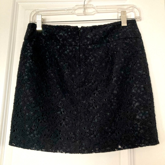 Black mini skirt with laser cut design over lining - Picture 1 of 10